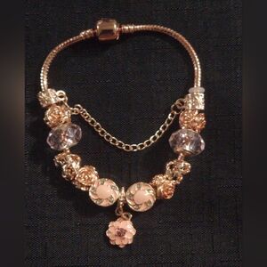 Elegant Rose Gold Bracelet with Pink Accents. ITEM No. 19-145